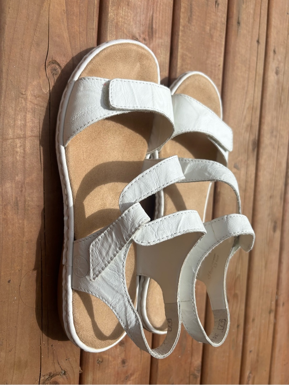 white Rieker sandals
